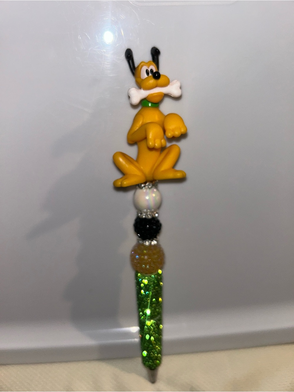 Hand Crafted Yellow Pluto Beaded Charm with Green Accent